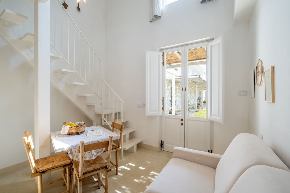 Deluxe Quadruple Room | 1 bedroom, minibar, individually decorated, individually furnished