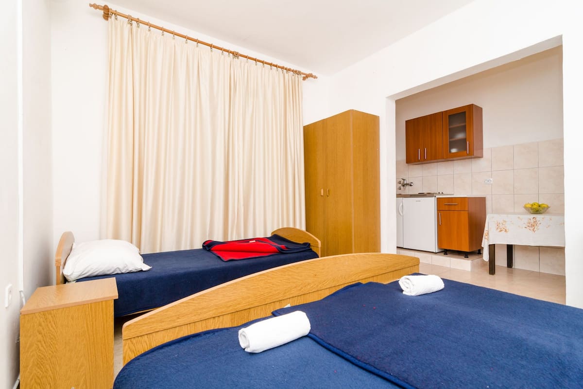 Studio | Peralatan tempat tidur premium, Wi-fi percuma, cadar katil