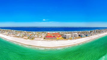 On the beach, sun loungers, beach towels