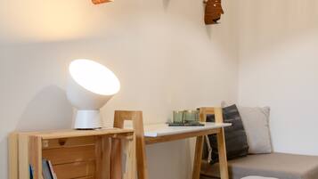 Deluxe Double or Twin Room | Living area | 32-inch LED TV with cable channels, TV, Netflix