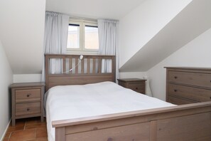 Apartamento, 2 quartos | 2 quartos, roupas de cama premium, Wi-Fi de cortesia, roupa de cama