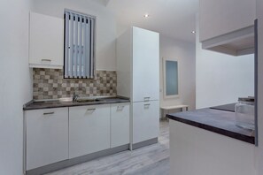 Apartment, 1 Bedroom | Private kitchen | Oven, stovetop, toaster, high chair - Modern Apartment Near the Promenade (Sliema)