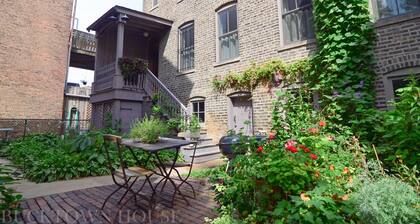 Casa de autocares Bucktown de 2 niveles y arbolada - Capacidad para 10