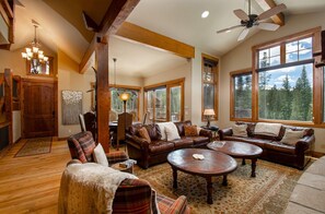 Open living & dining room with oversized windows