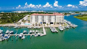 A large hotel with multiple floors, a marina with boats, and a clear blue sky. - Incredible Views - Magnificent Sunsets
I Little Piece of Heaven
 (Beaufort)
