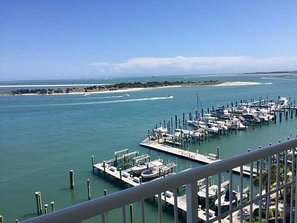 A marina with boats docked at piers, a clear sky, and a sandy beach in the distance. - Incredible Views - Magnificent Sunsets
I Little Piece of Heaven
(Beaufort)