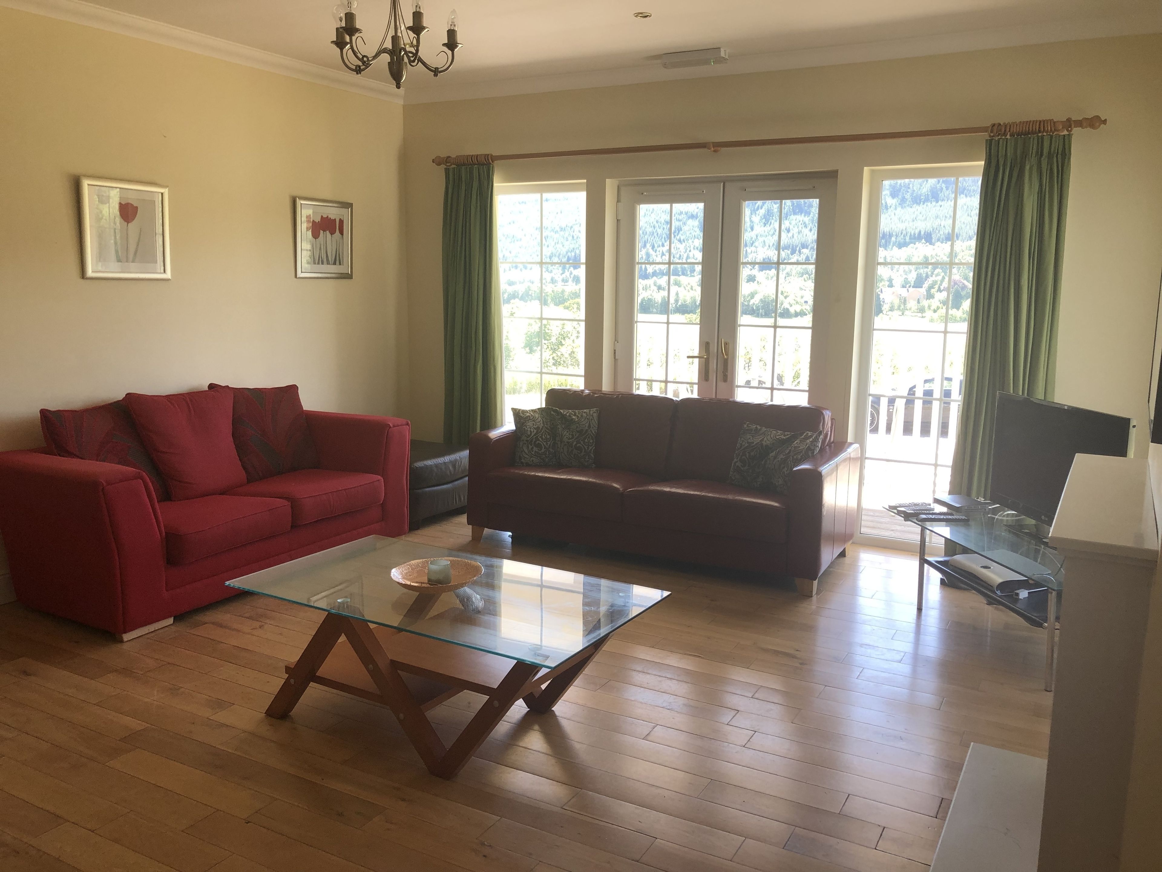 Deluxe Triple Room | Living area