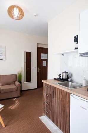 Apartemen, 1 kamar tidur | Area keluarga | TV LED