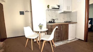 Apartamento, 1 quarto | Área de estar | TV LED