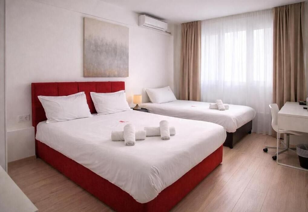 Premium bedding, blackout curtains, soundproofing, iron/ironing board