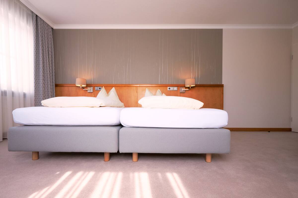 standard double or twin room | premium bedding, down duvets, minibar, in-room safe