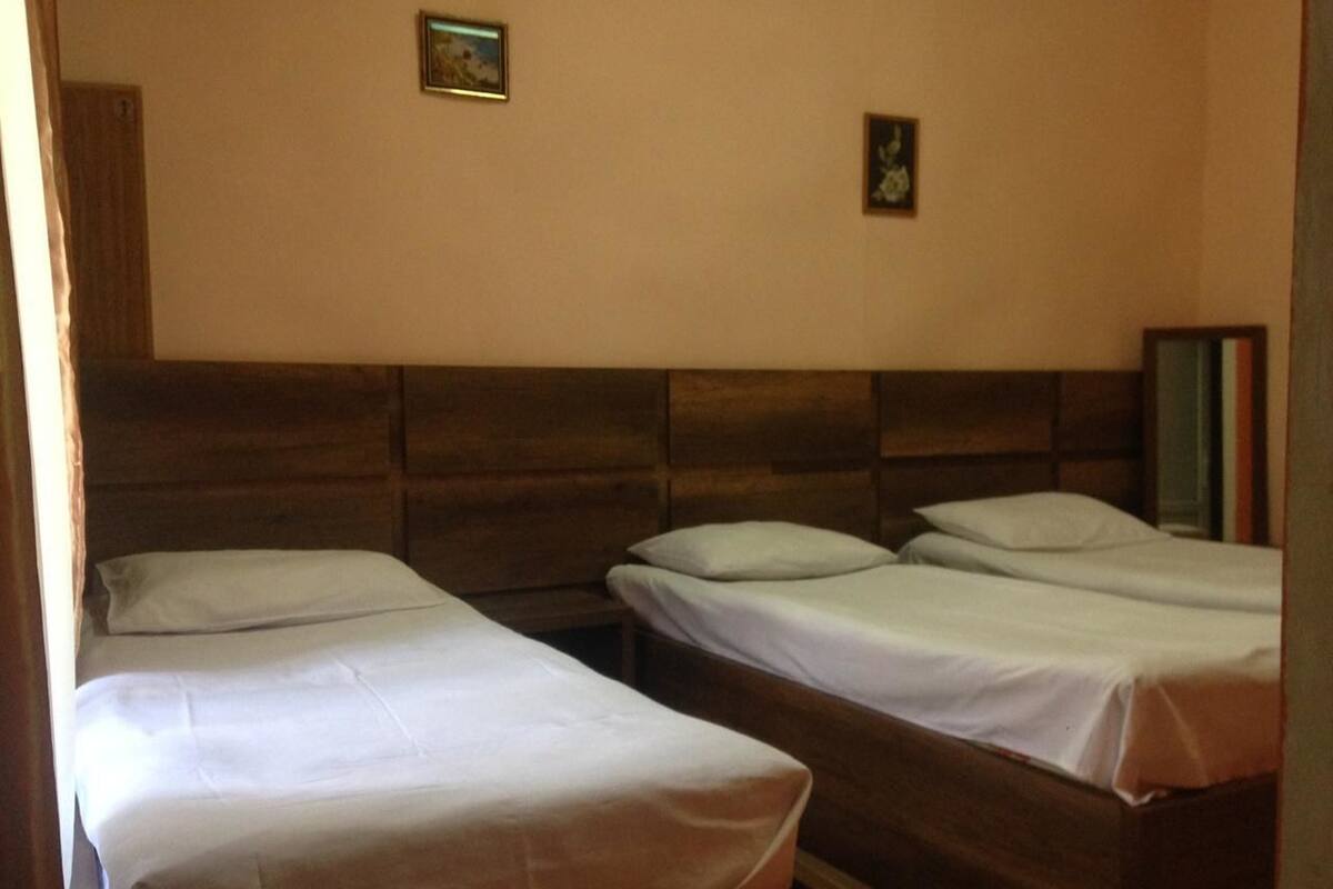 Triple Room | Iron/ironing board (on request), WiFi (free), bed sheets