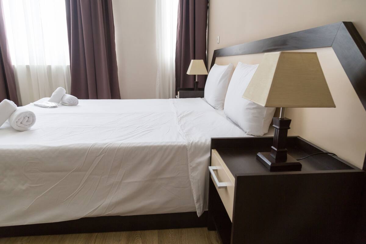 Blackout curtains, iron/ironing board, free WiFi, bed sheets