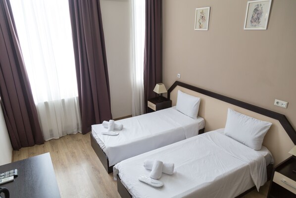Blackout curtains, iron/ironing board, free WiFi, bed sheets