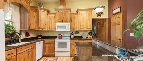 Microwave, oven, toaster, dining tables