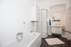 Apartment | Bathroom | Combined shower/tub, slippers