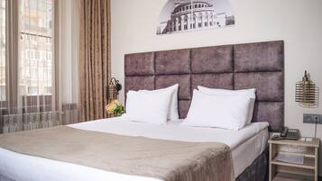 Standard Double or Twin Room | Minibar, in-room safe, desk, laptop workspace