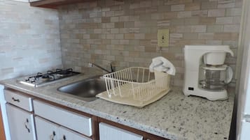 Full-size fridge, microwave, stovetop