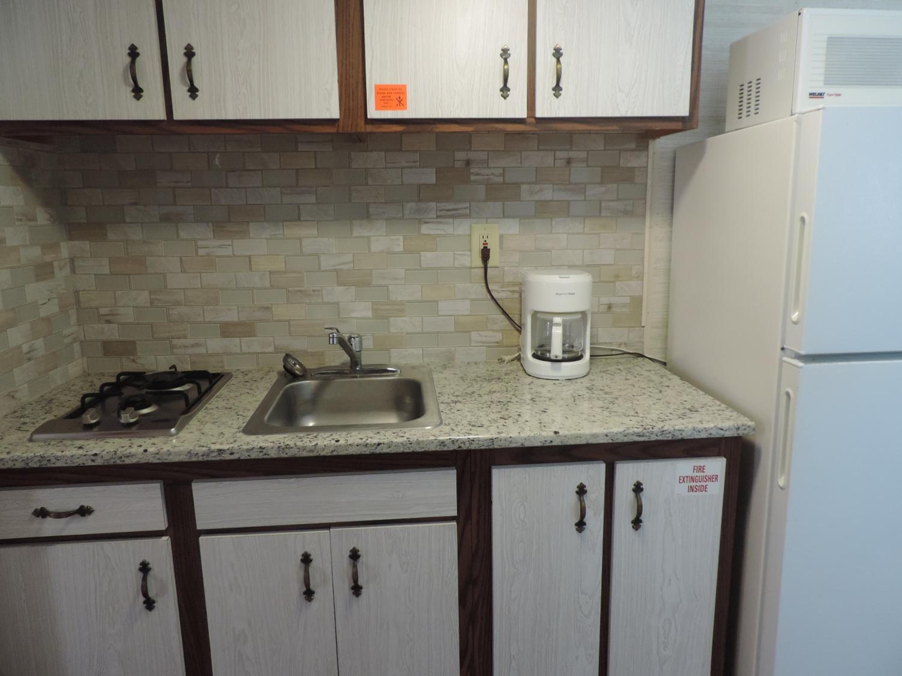 full-sized fridge, microwave, stovetop