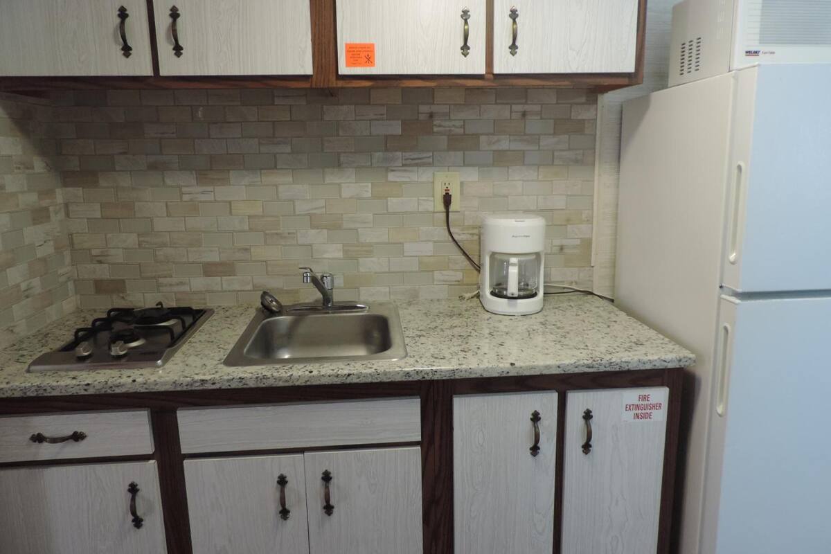 full-sized fridge, microwave, stovetop