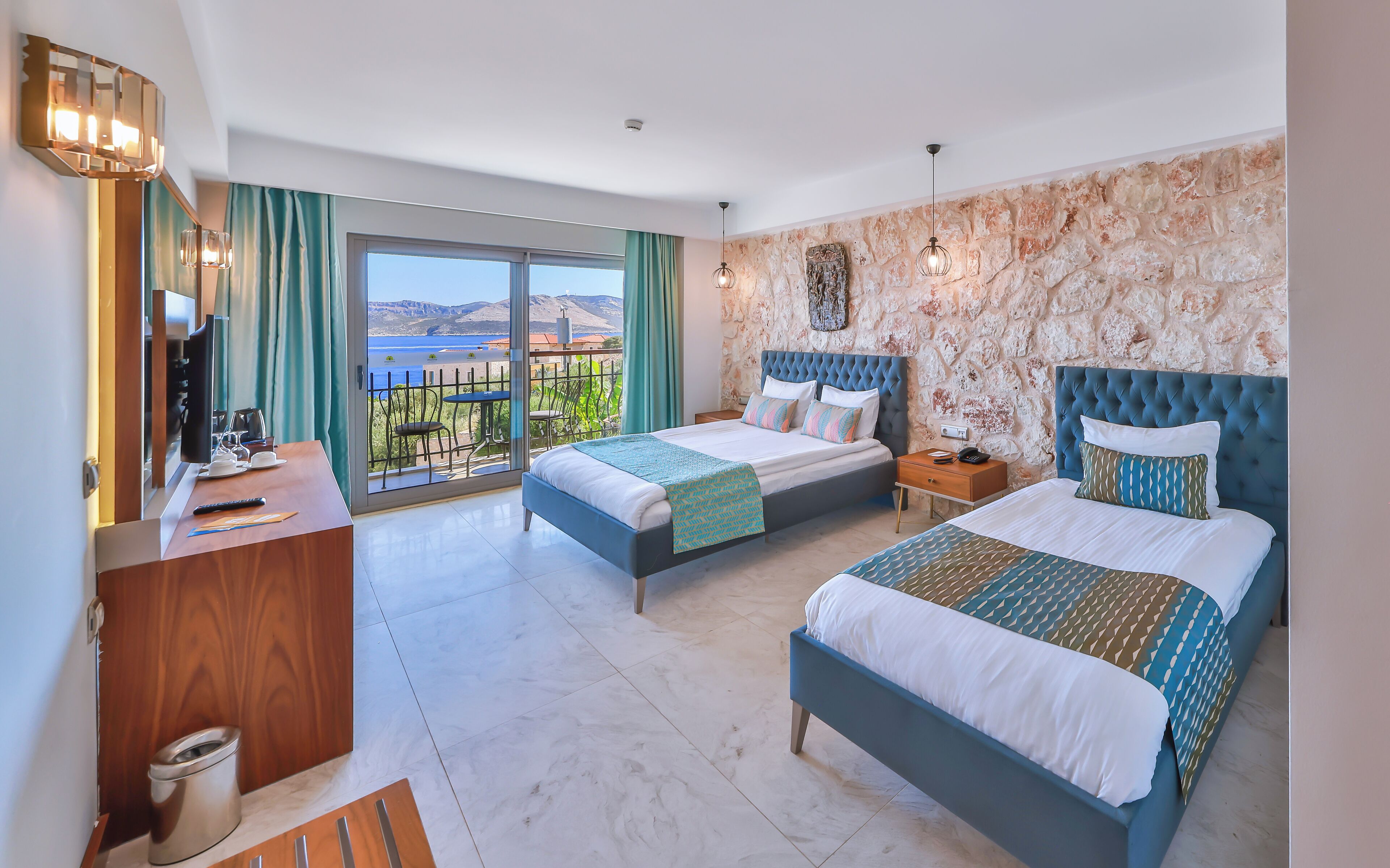 family room, sea view | 1 bedroom, premium bedding, in-room safe, blackout curtains