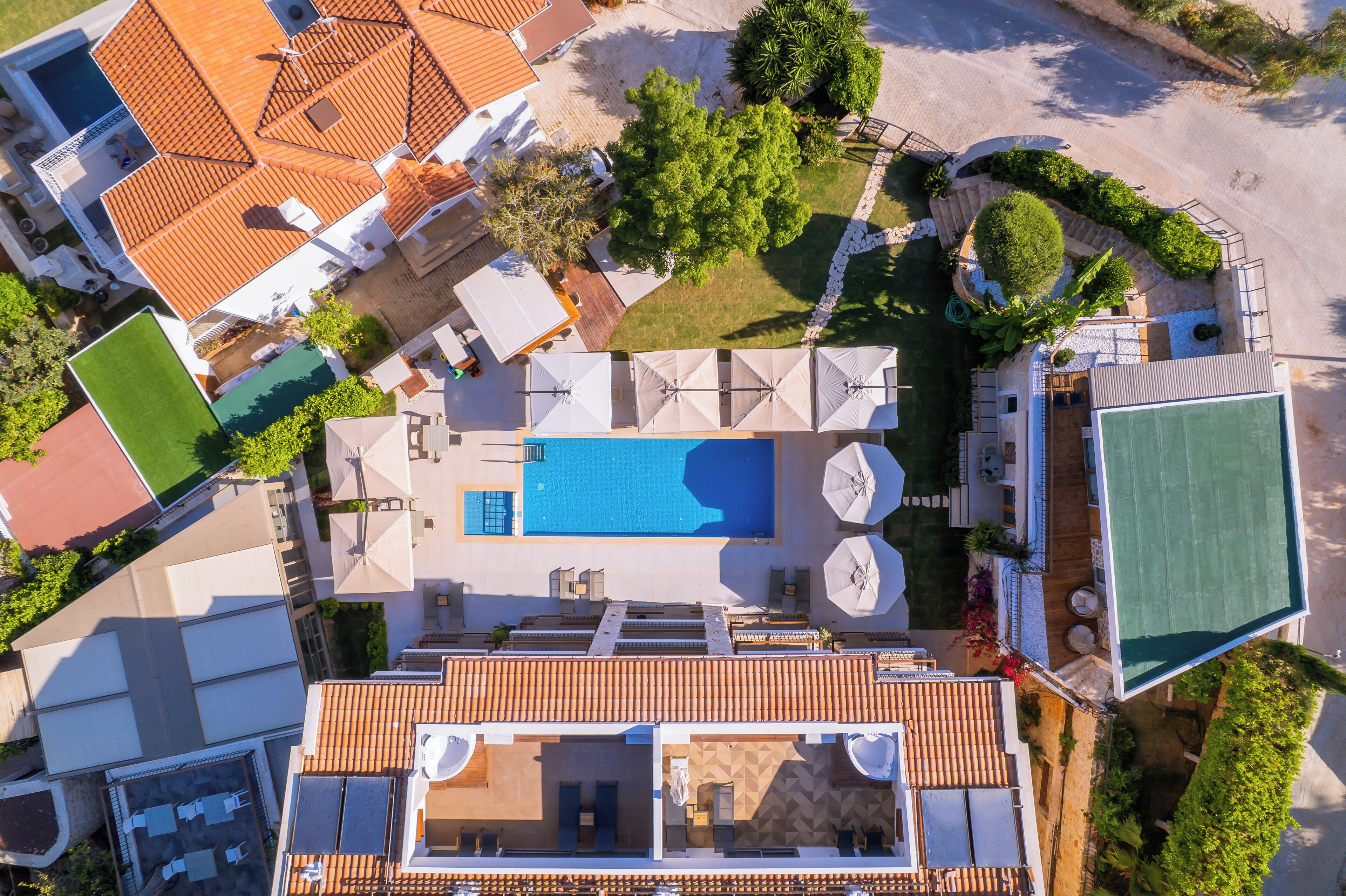 seasonal outdoor pool, open 10:30 am to 8:00 pm, pool umbrellas