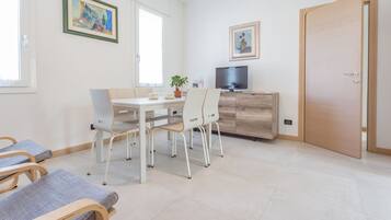 Apartment, 2 Bedrooms | Living area | Flat-screen TV