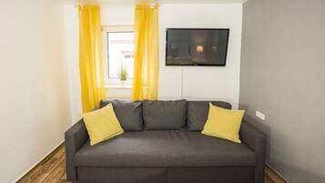 Apartment | Living area | Flat-screen TV