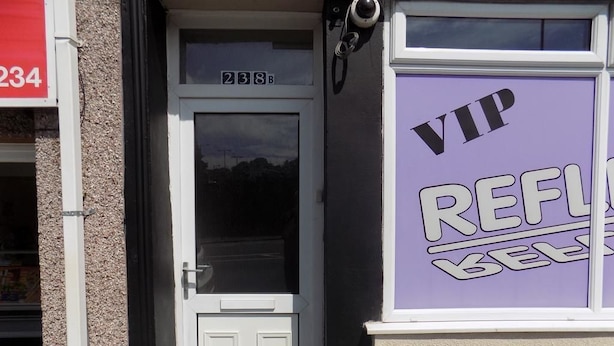 A building entrance with a door marked "238B" and a purple sign reading "VIP REFRESH BEER". - Comfort Rooms (Plymouth)