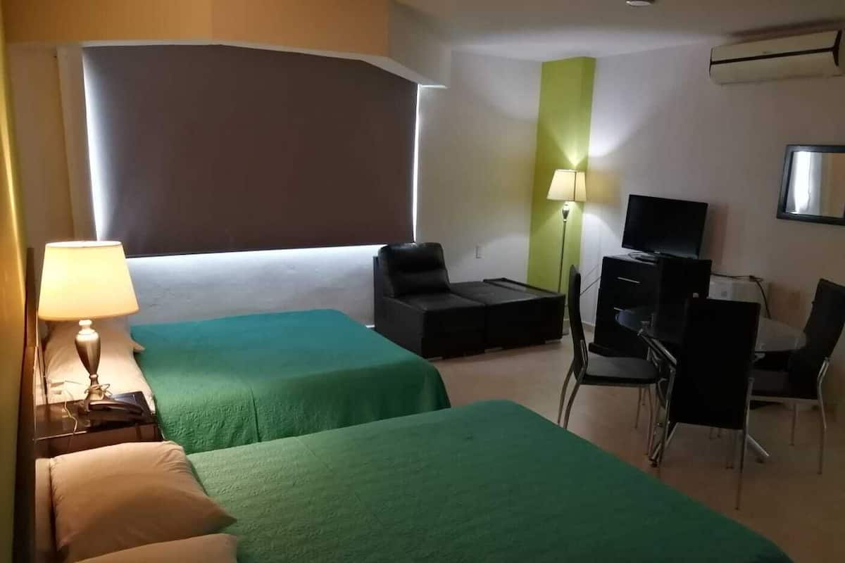 Blackout curtains, iron/ironing board, free WiFi, bed sheets