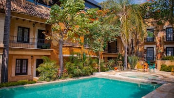 Outdoor pool, open 9:00 AM to 9:00 PM, pool umbrellas, sun loungers
