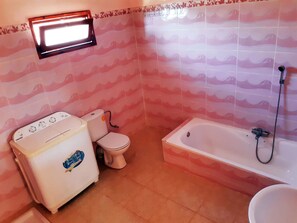 Standard Double Room | Bathroom | Deep soaking tub, towels