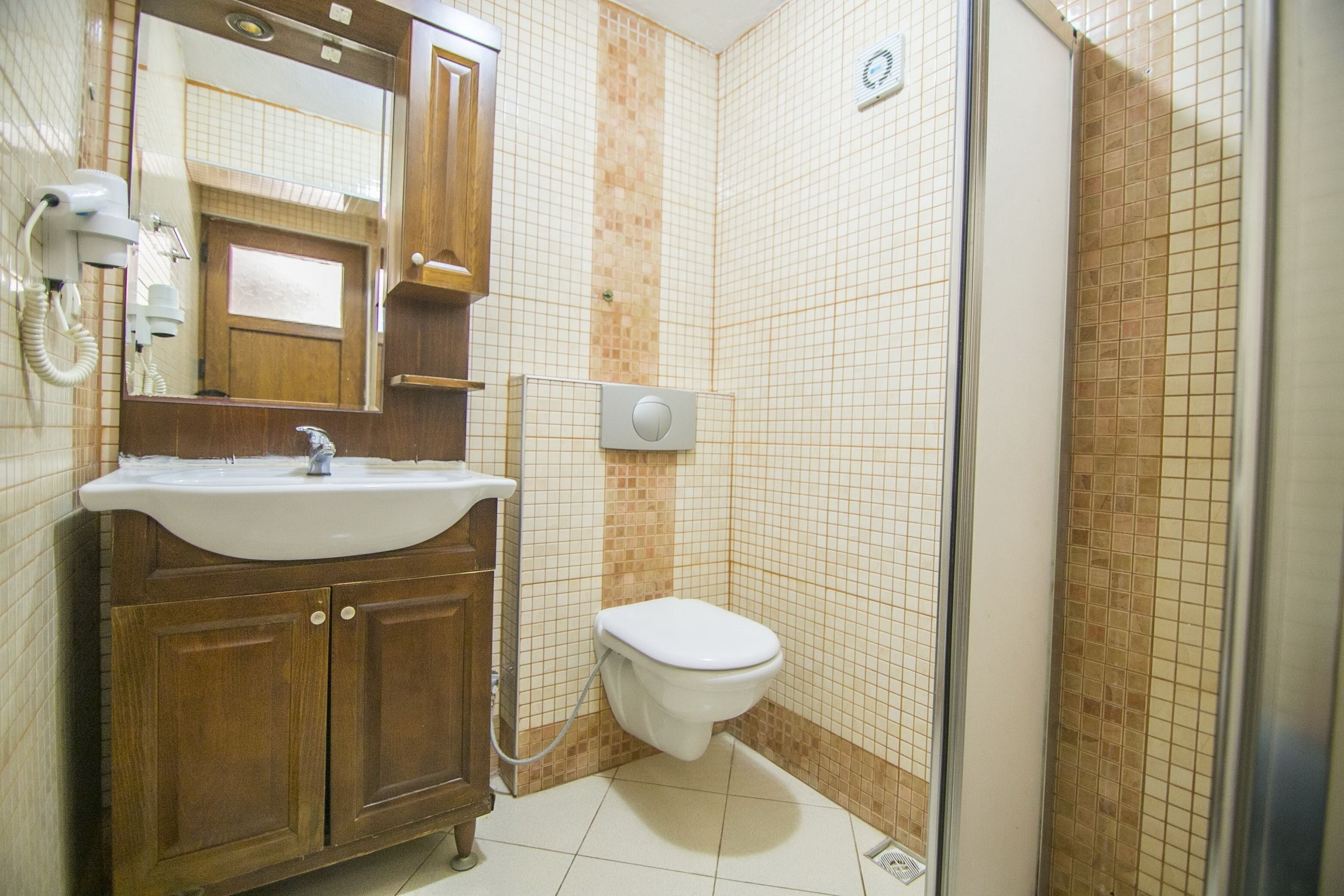 family room | bathroom | shower, hair dryer, slippers, towels