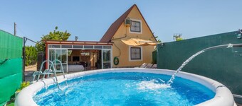 Little house among oranges