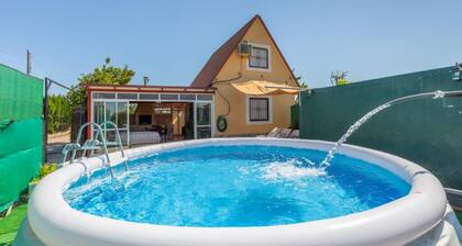 Little house among oranges