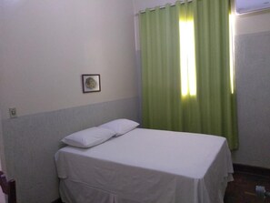 Desk, blackout curtains, free WiFi, bed sheets