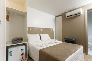 Double Room | Minibar, blackout drapes, iron/ironing board, free WiFi