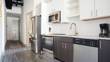 Deluxe Apartment (Self Check-in with Virtual Front Desk) | Private kitchen | Full-size fridge, microwave, oven, stovetop