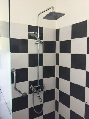 Suite, 2 Bedrooms | Bathroom | Shower, rainfall showerhead, free toiletries, hair dryer