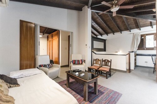 Bright Studio surrounded by trees