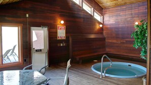 A wooden cabin interior with a pool, a bench, and a table. - Lift Tickets Near Ski Hot Tubs Wifi Fireplace, Multi-level Unit (Steamboat Springs)