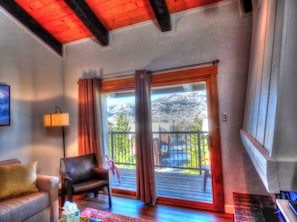 Condo | Living room | TV, fireplace, DVD player - Lift Tickets Pool, Hot Tubs, Shuttle & Private Deck Mountain Village (Steamboat Springs)