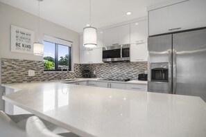 Deluxe Apartment, 1 Bedroom (Unit 3) | Private kitchen | Full-size fridge, microwave, stovetop, dishwasher