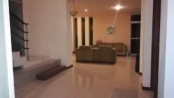Comfort Quadruple Room, 2 Double Beds | Living area