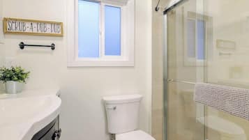 Shower, eco-friendly toiletries, hair dryer, towels