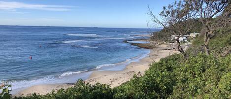 Beach nearby, sun loungers