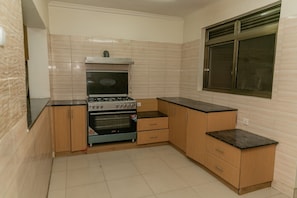 Habitación familiar, varias camas | Cocina privada