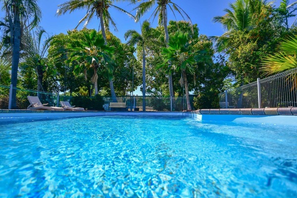 Outdoor pool, open 6:00 AM to 9:00 PM, sun loungers