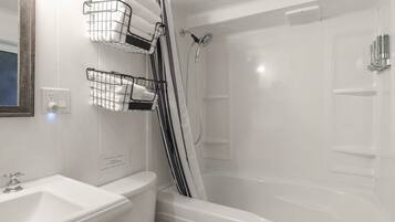 Combined shower/tub, eco-friendly toiletries, hair dryer, towels