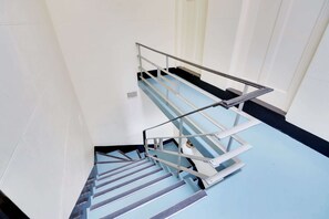 stair acces to apartment on first floor